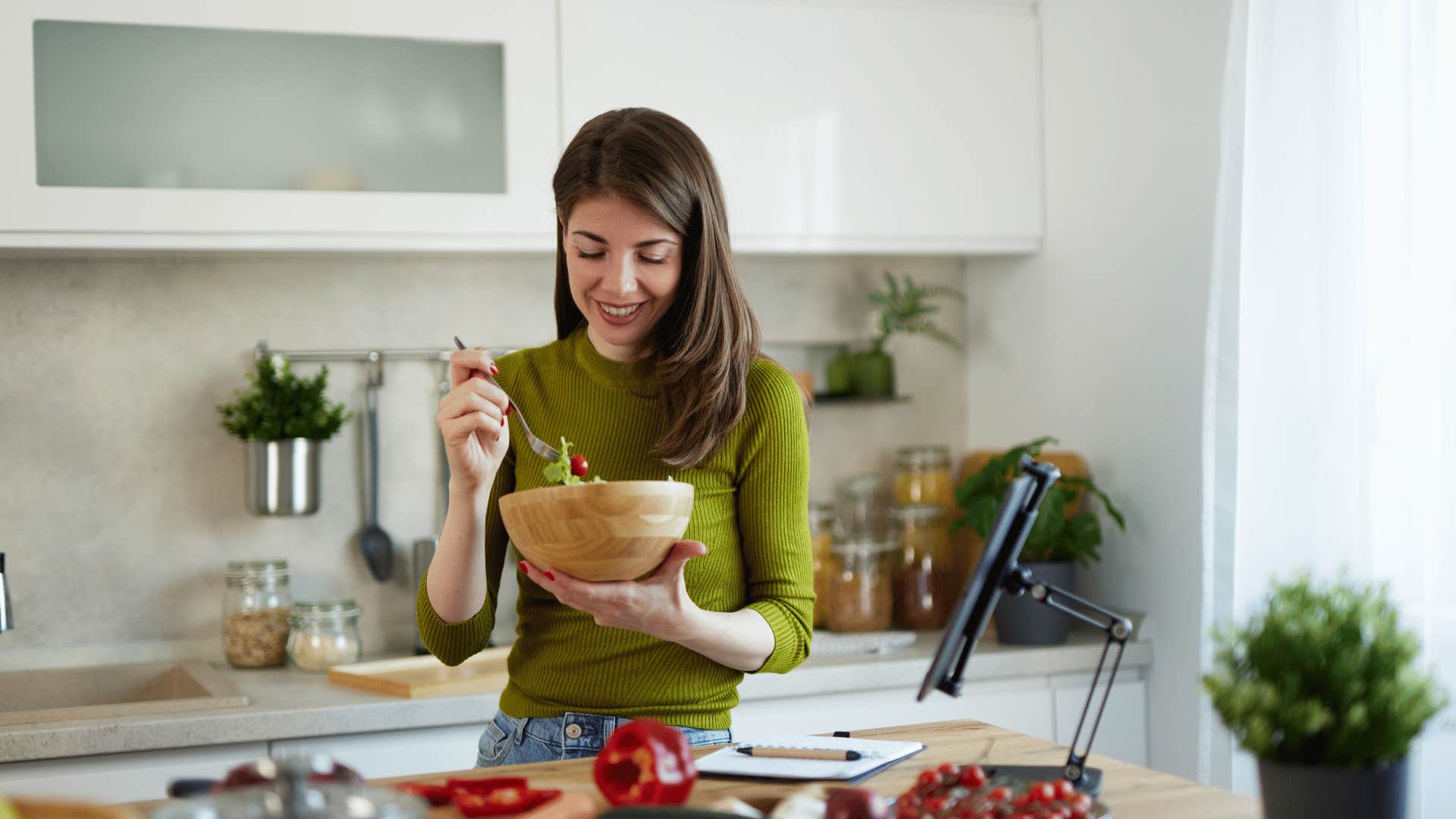 woman eating a salad