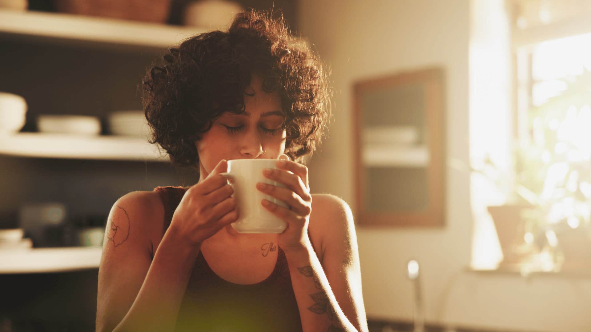 woman drinking coffee in morning