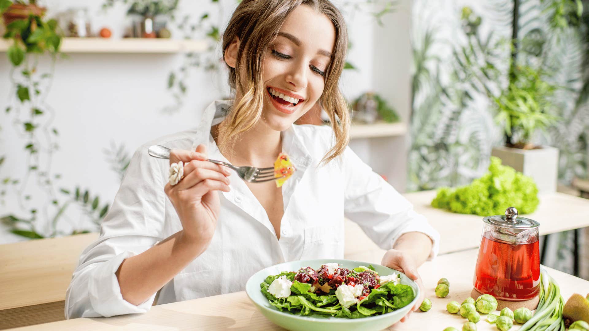 woman eating vegetables