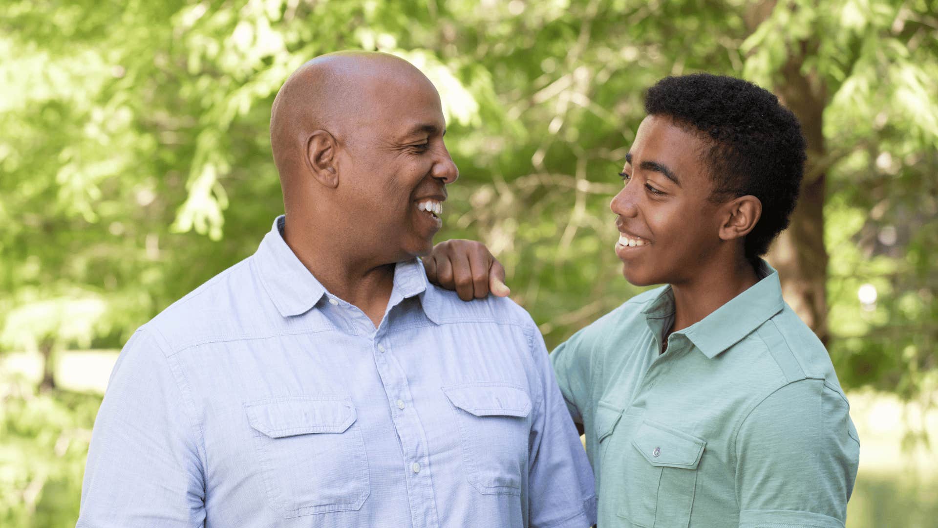 man talking to son