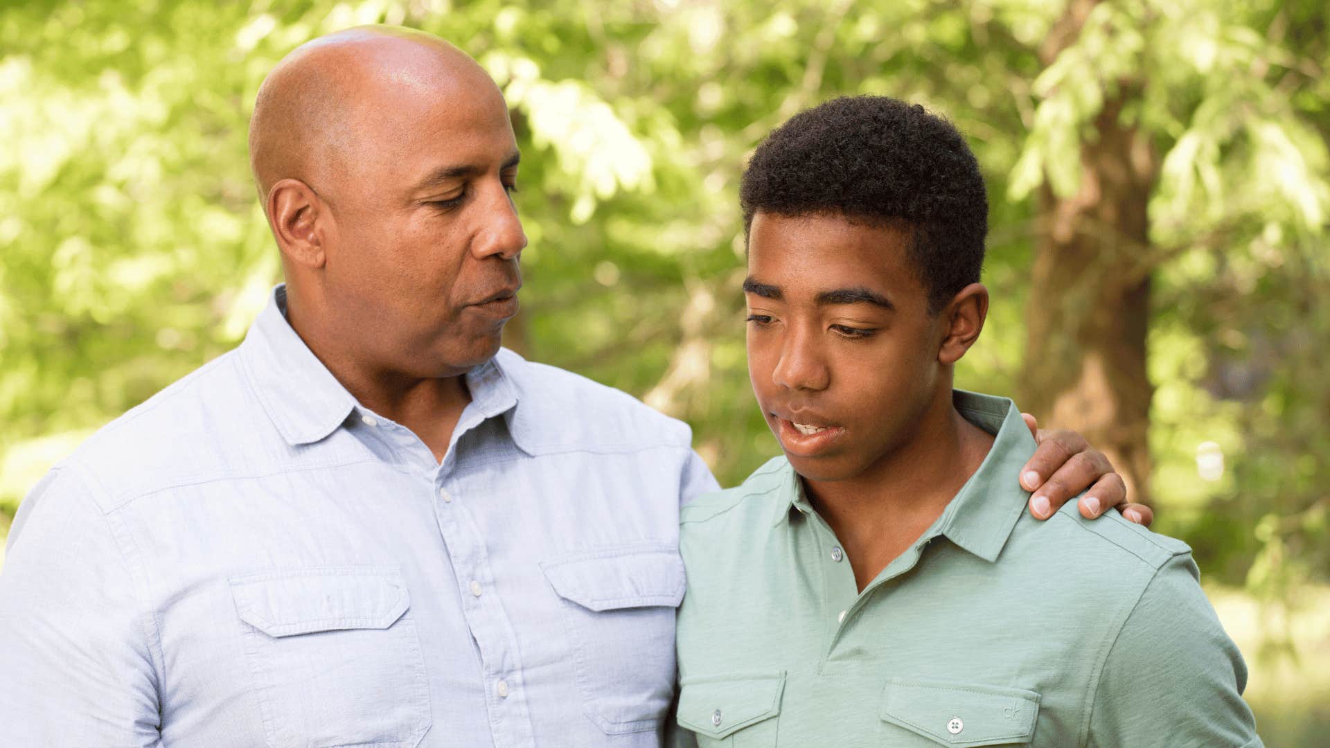 father talking to son