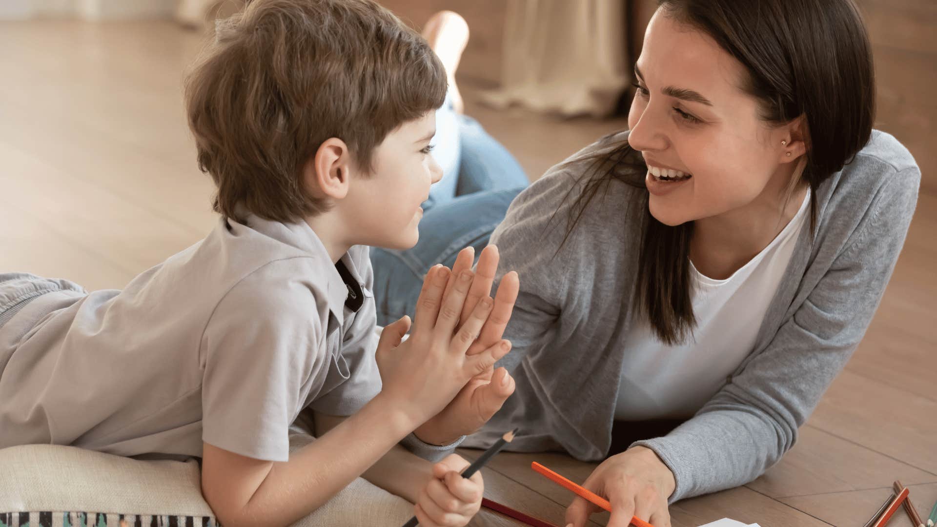 mother high fiving son