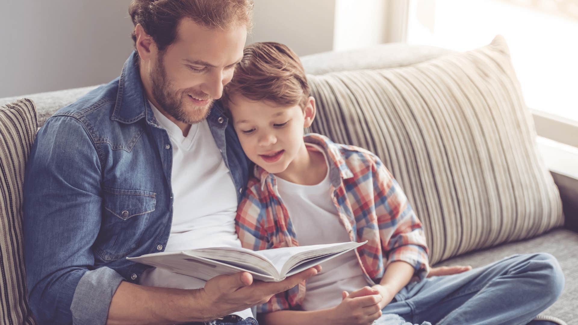 father reading to child