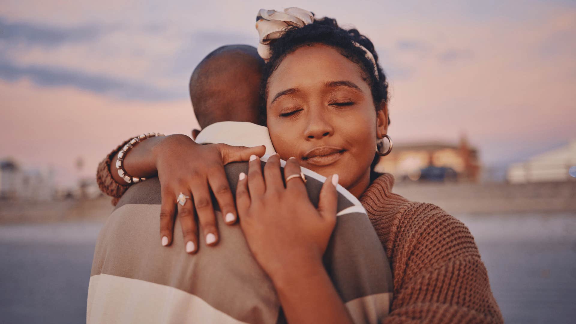 woman embracing man