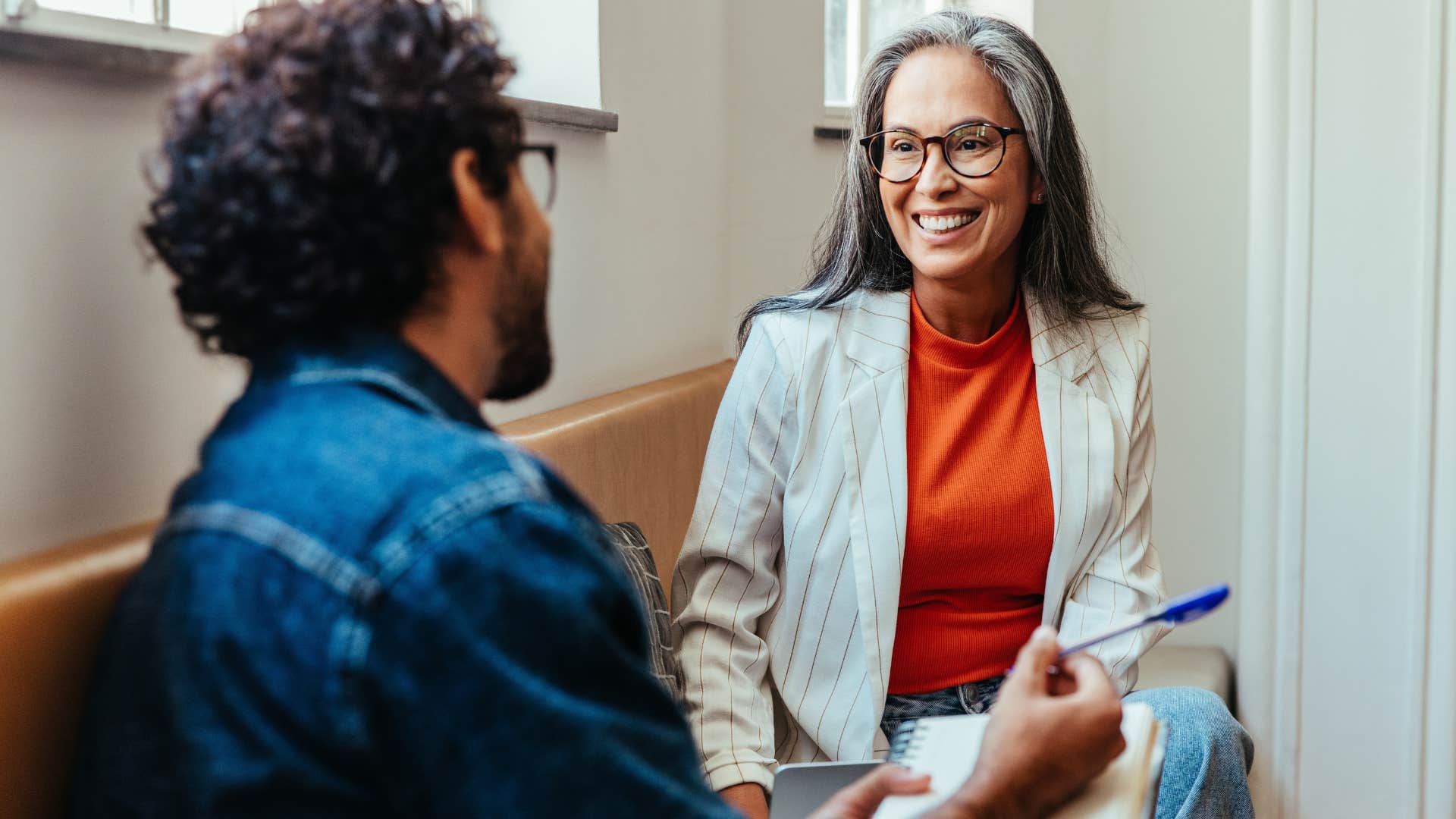 woman talking to her co-worker