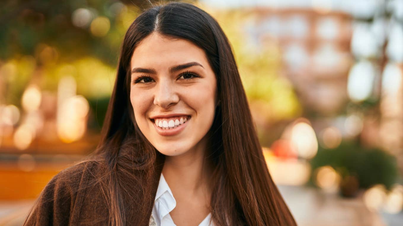 brilliant woman smiling happily