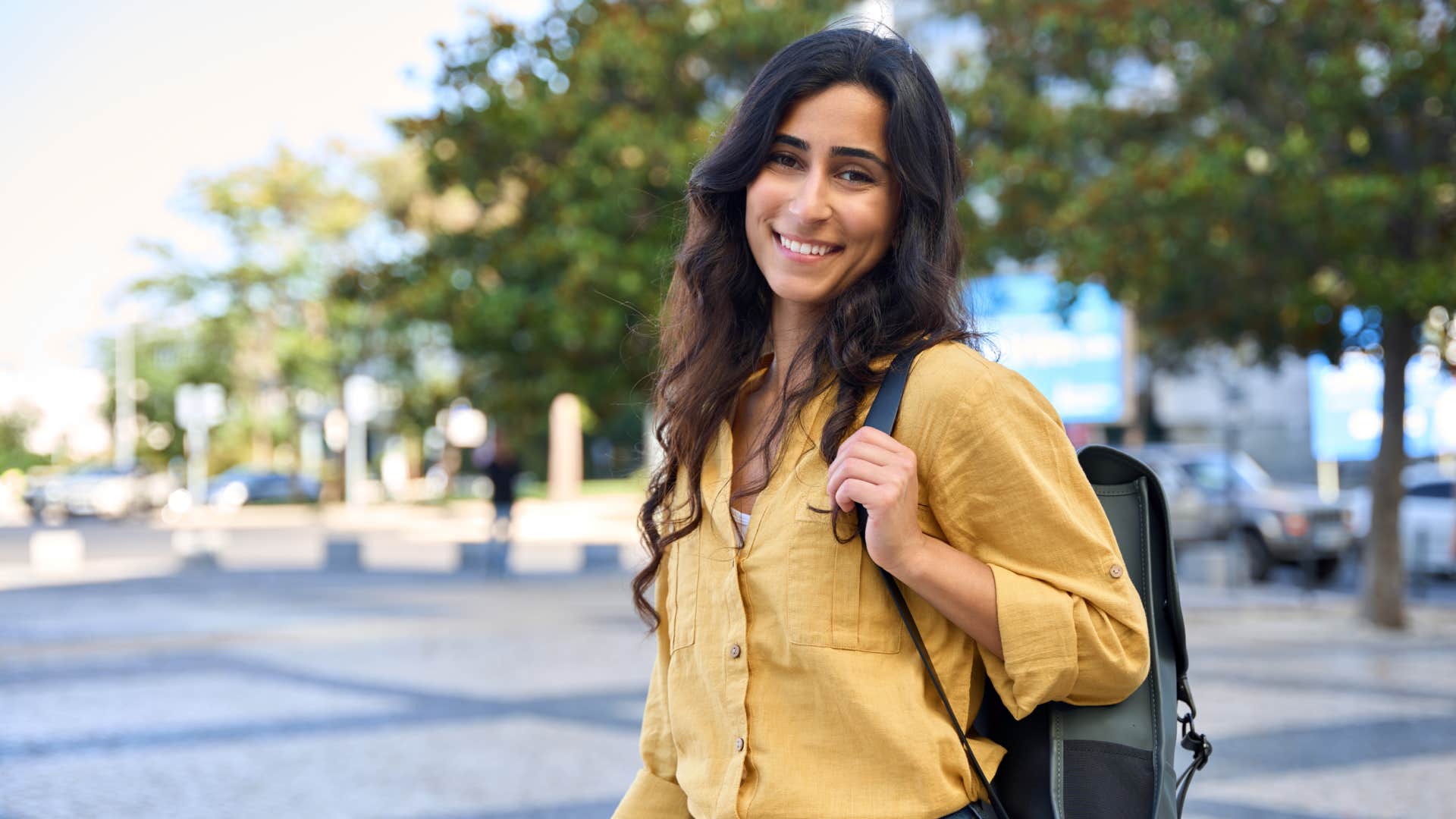 Smiling student with a backpack 