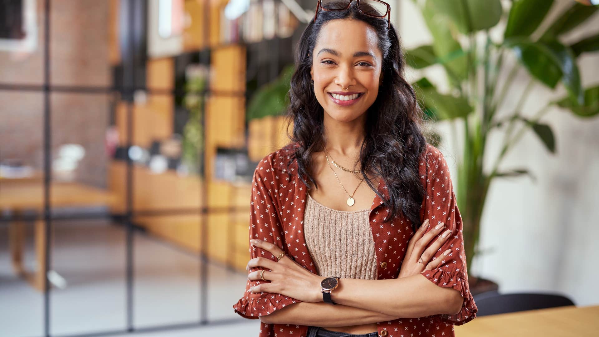 smiling young woman with neat and organized appearance