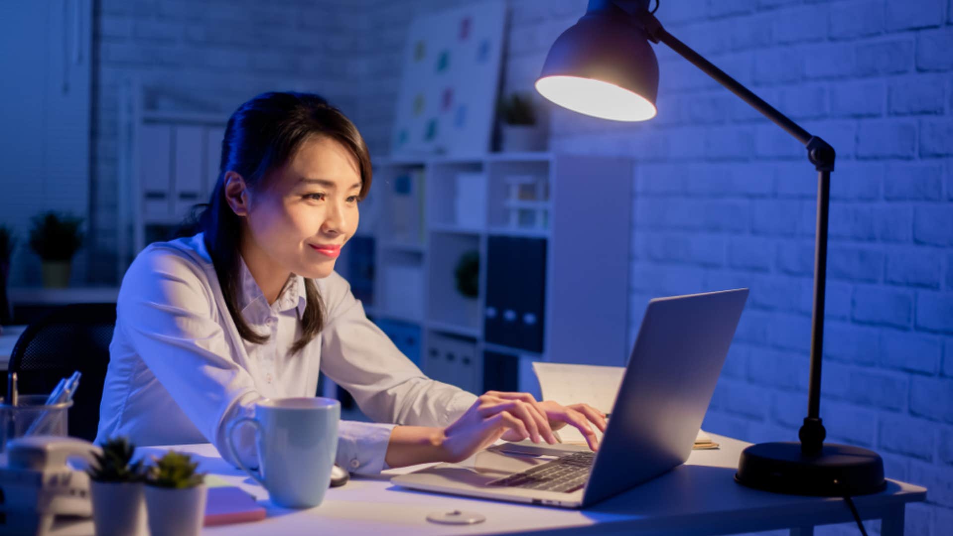 woman working side hustle at night