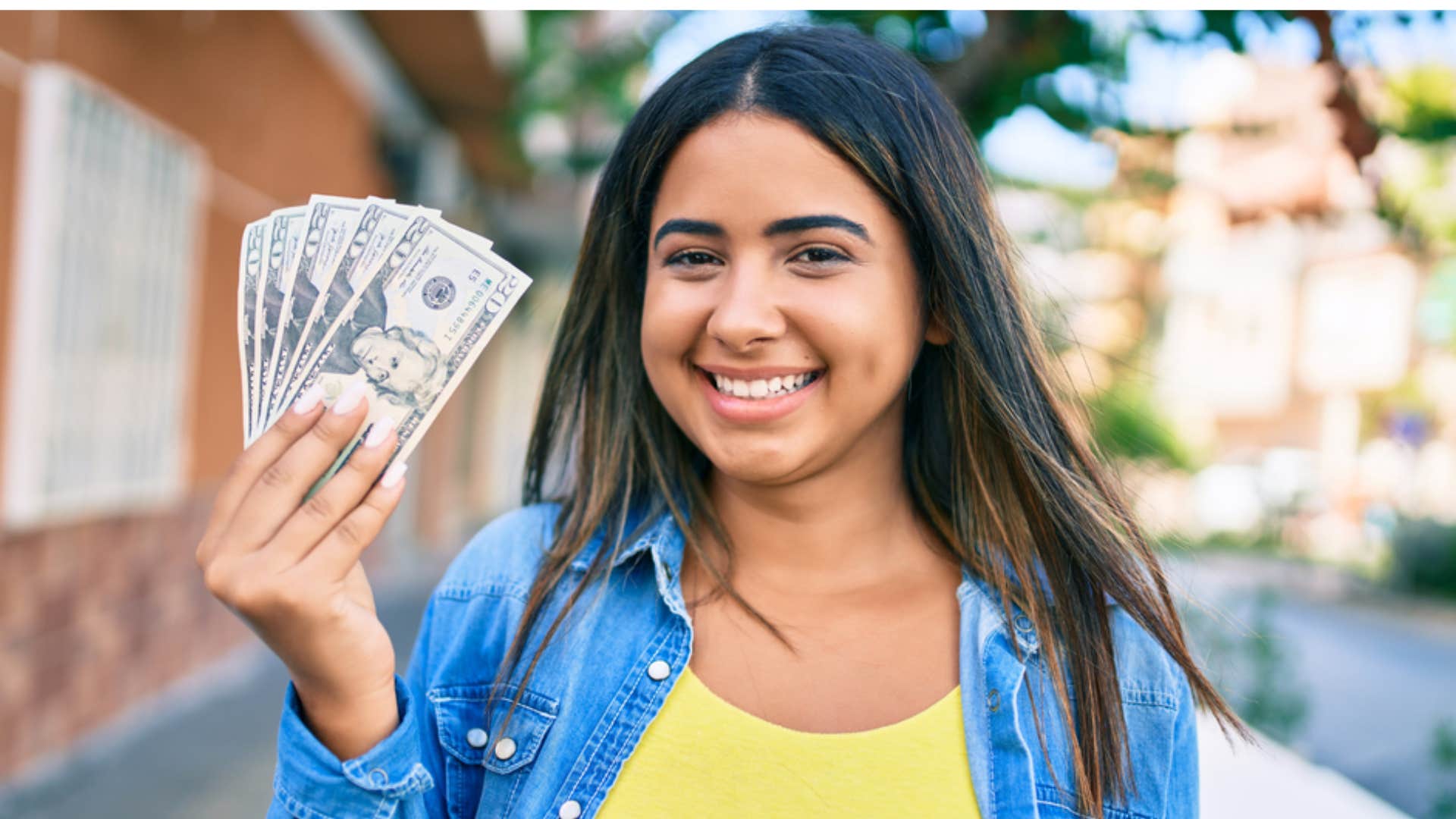 woman holding money