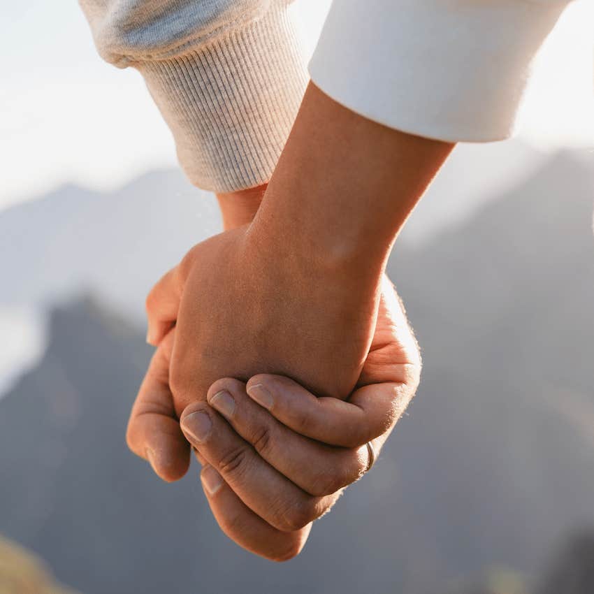 Close up of a happy couple's hands 