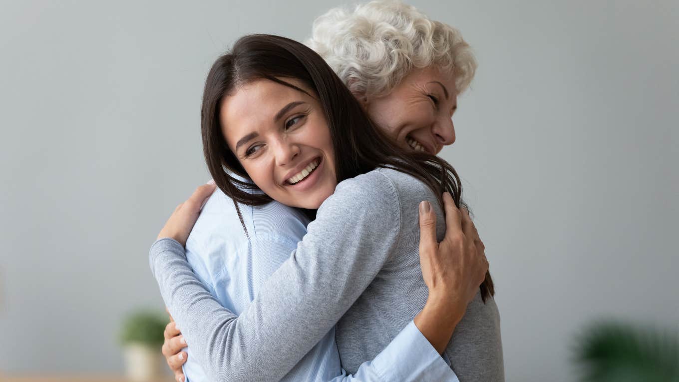 Woman showing affection to her parent