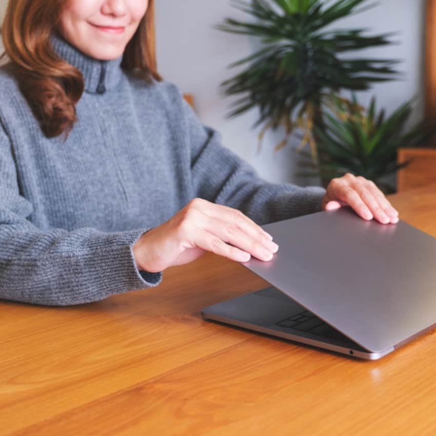 woman closing laptop transitional ritual energy enjoy weekend