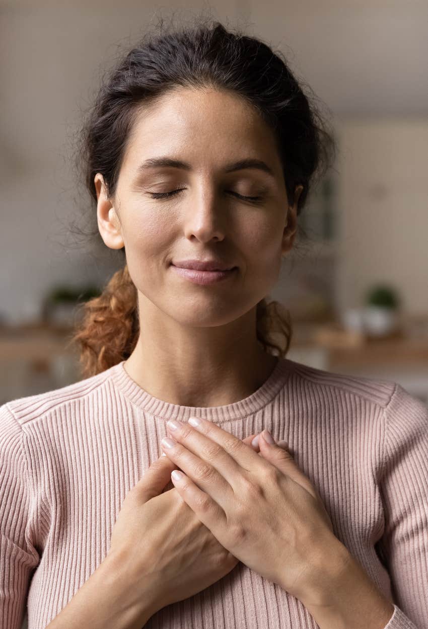 Woman practicing gratitude to hack the universe's piggy bank