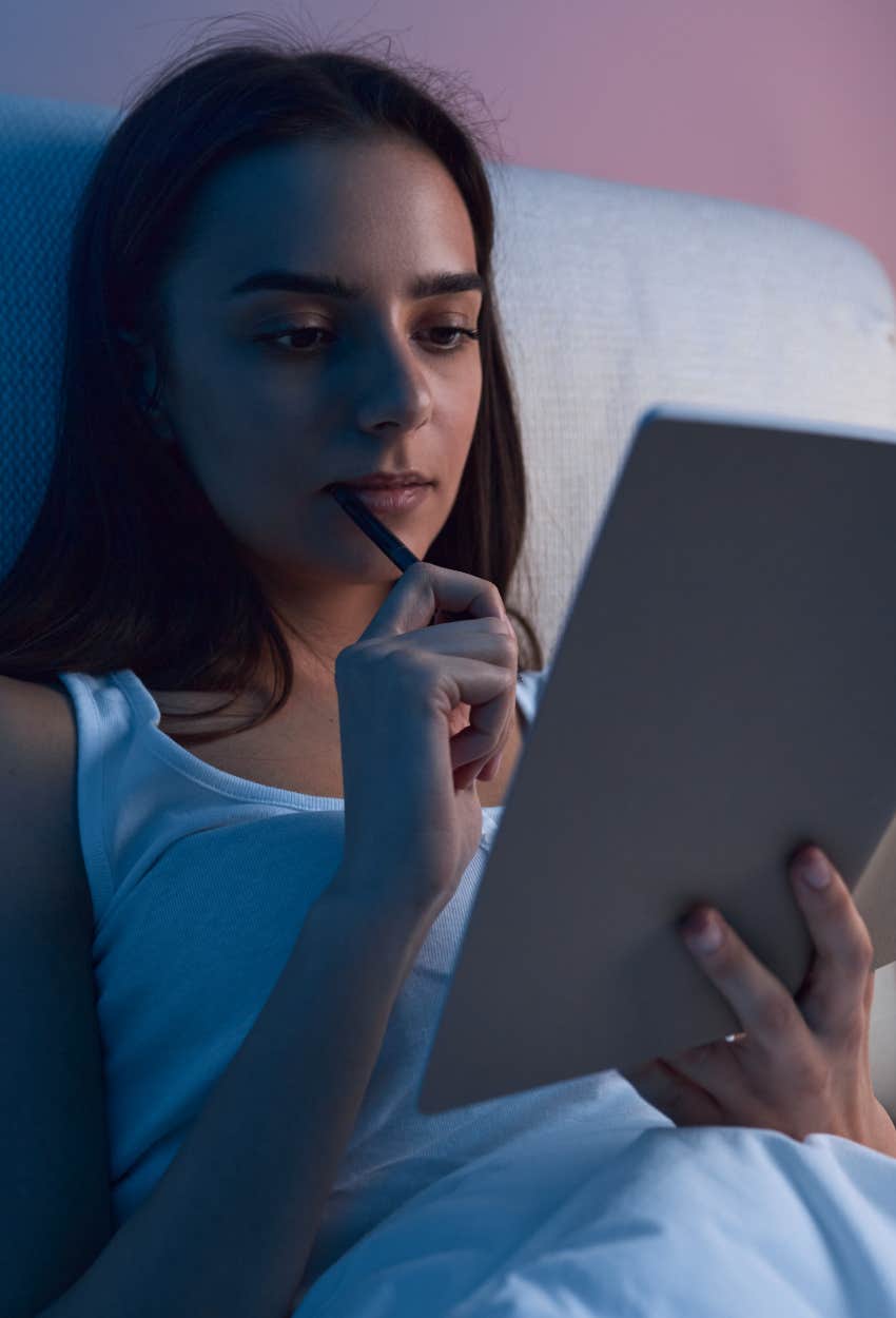 Woman writing a to-do list before bed