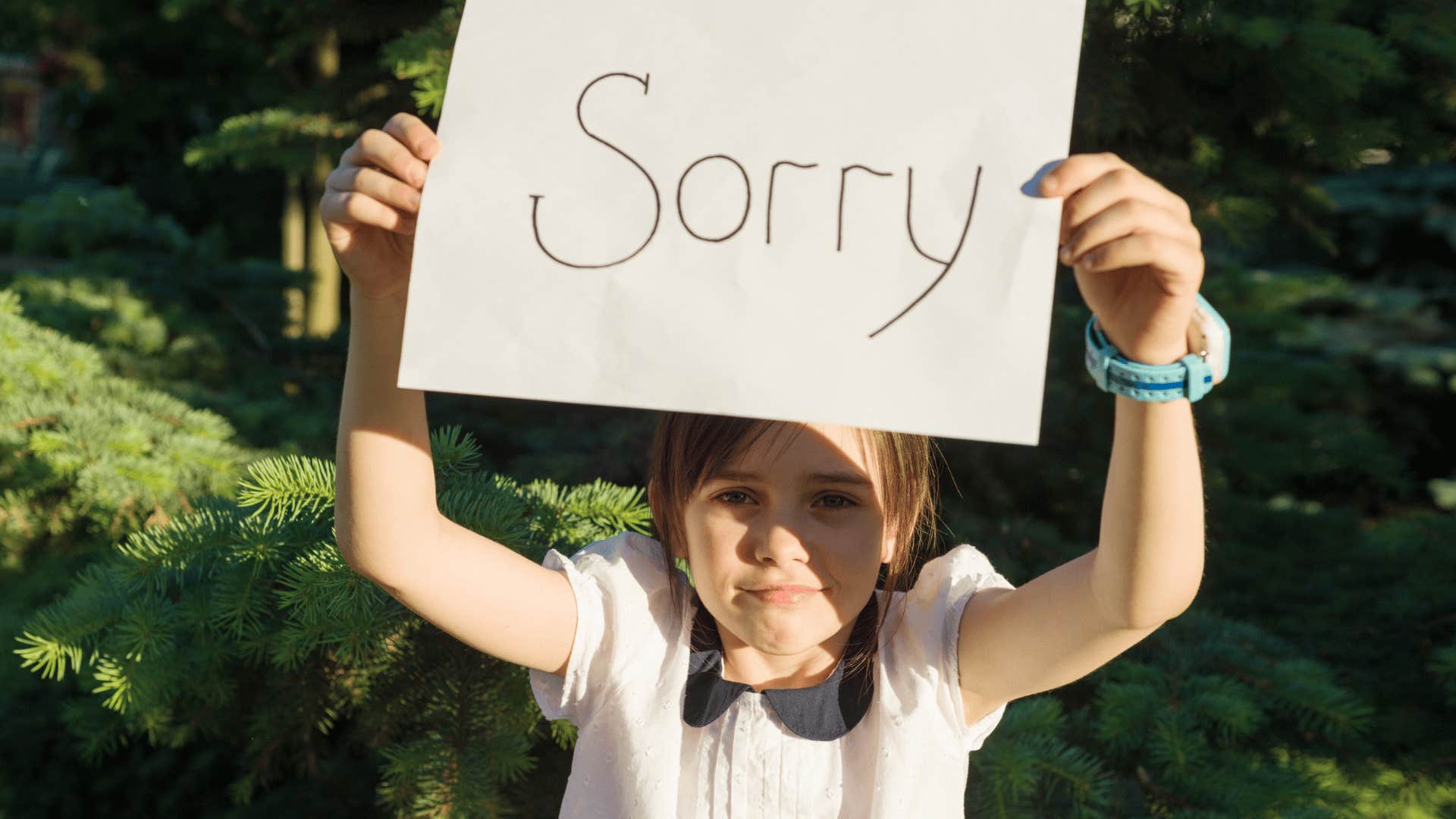 girl apologizing