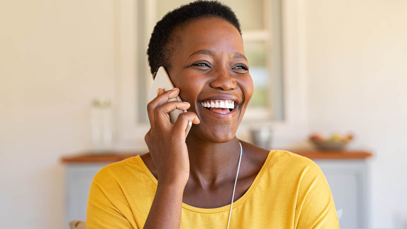 Woman smiling and talking on her phone