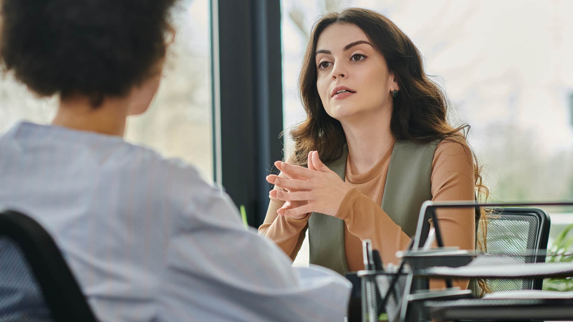 Women enjoying a debate at work