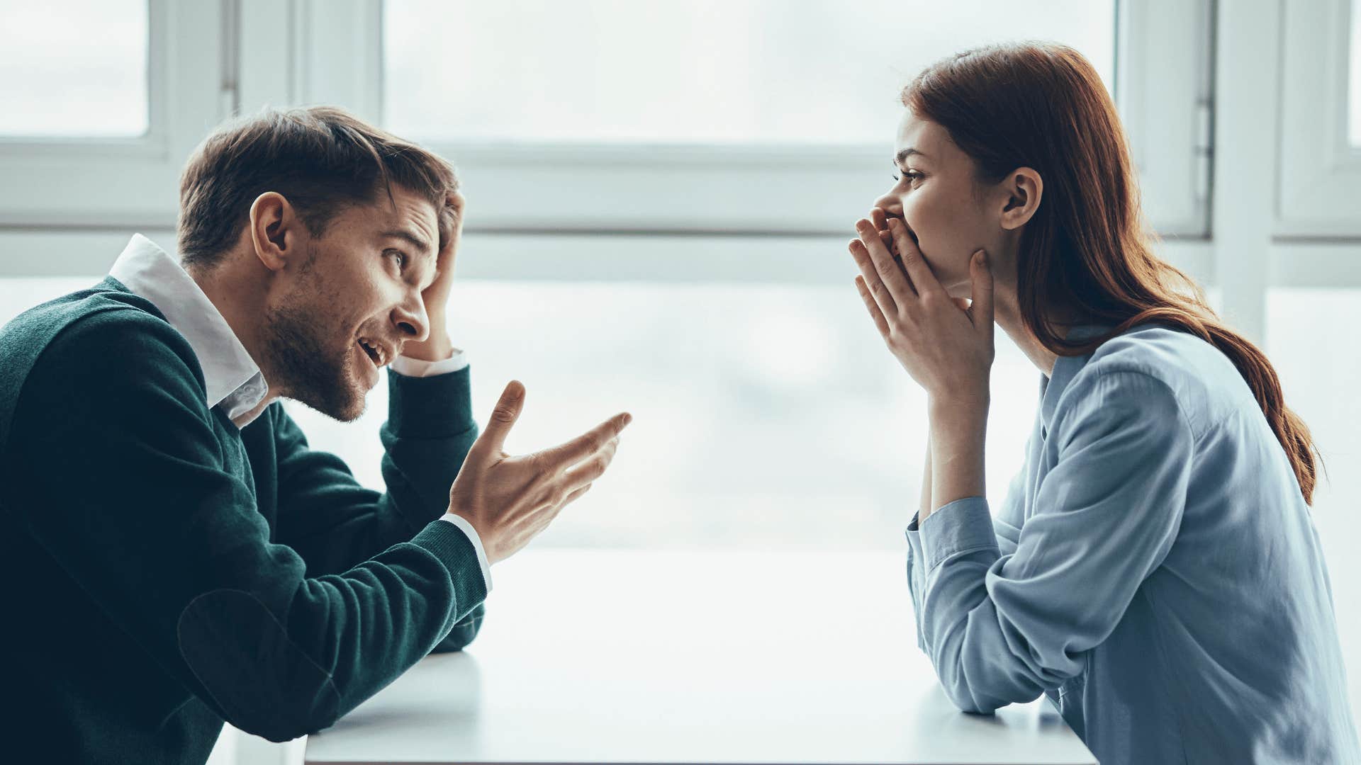 man and woman being vulnerable during conversation