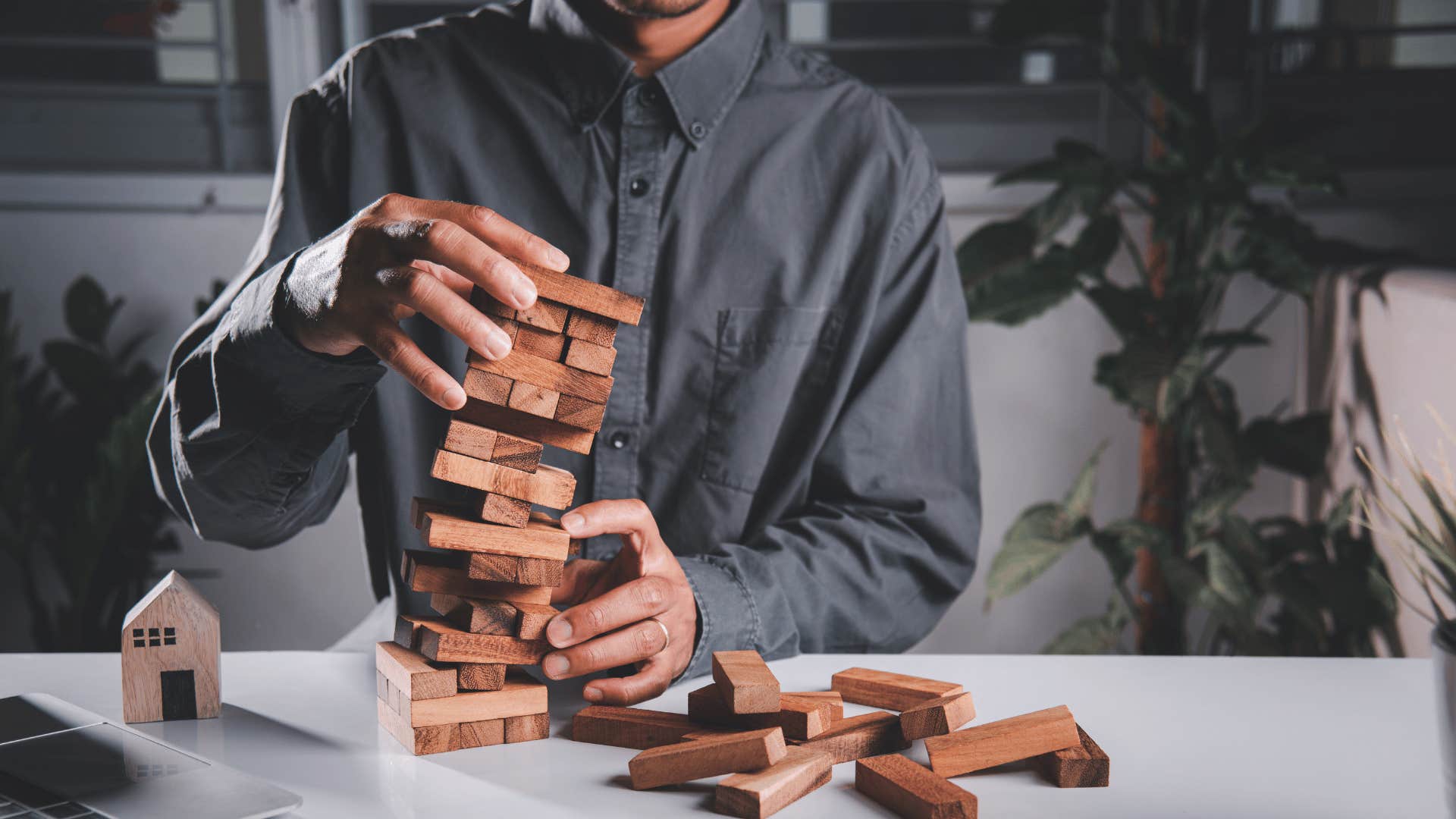 man playing jenga