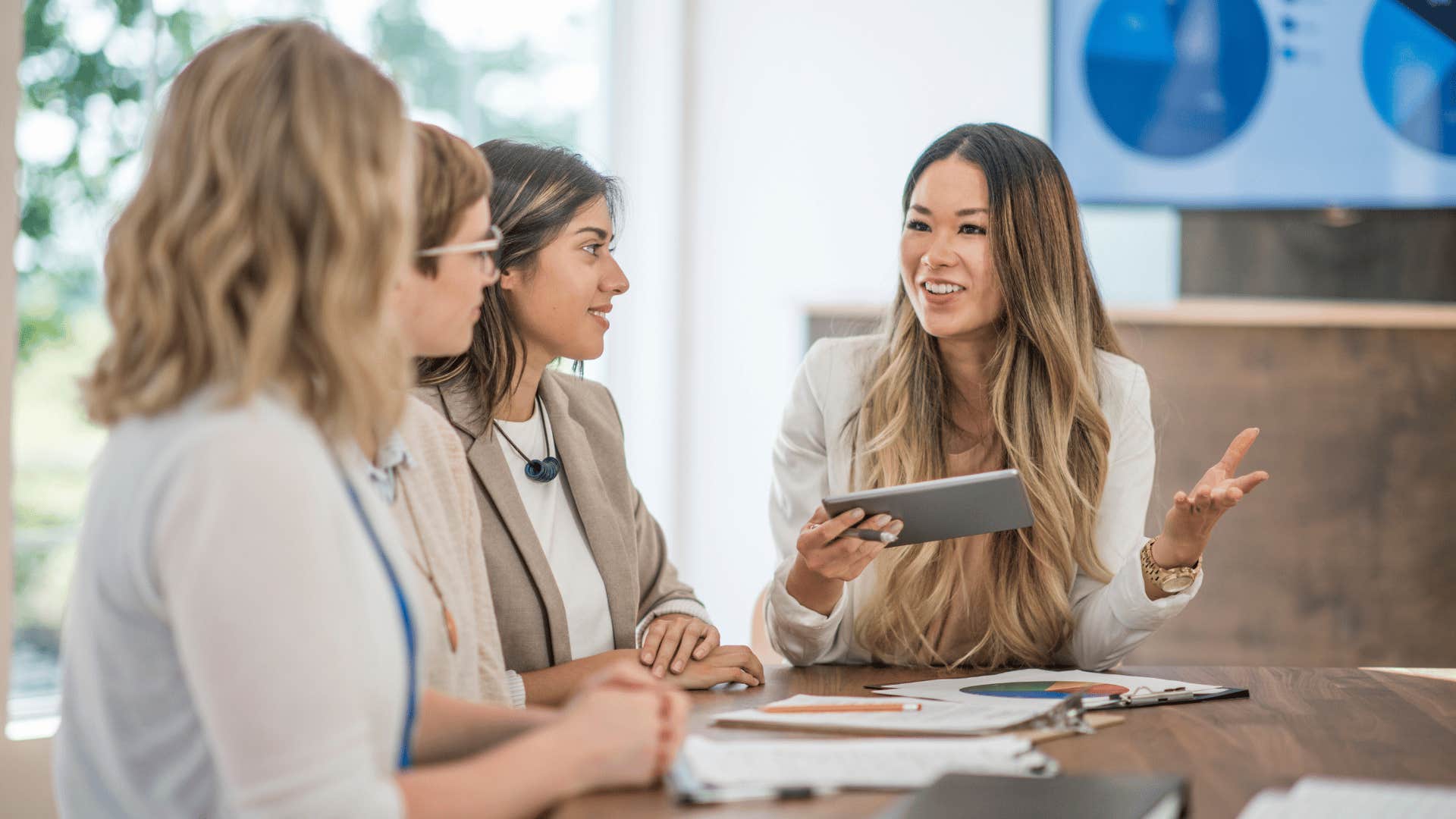 woman taking responsibility at a meeting