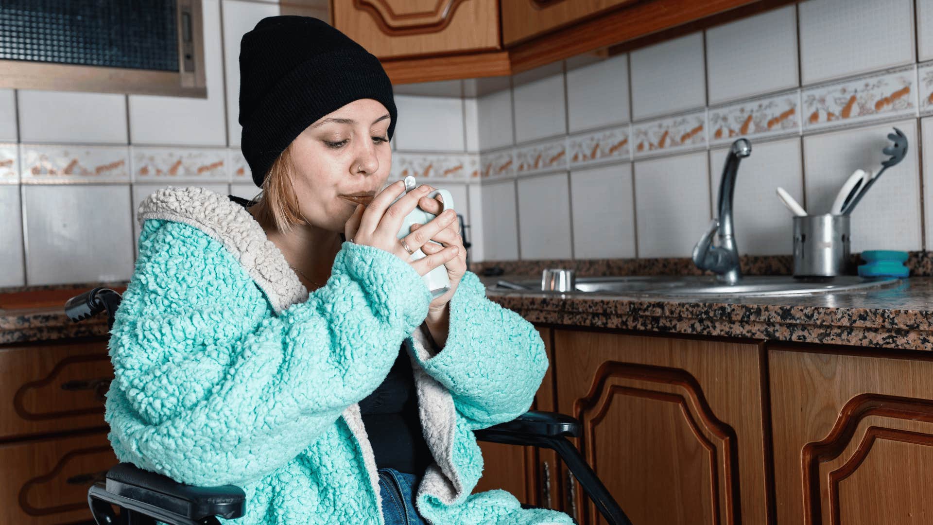 woman drinking from her favorite mug