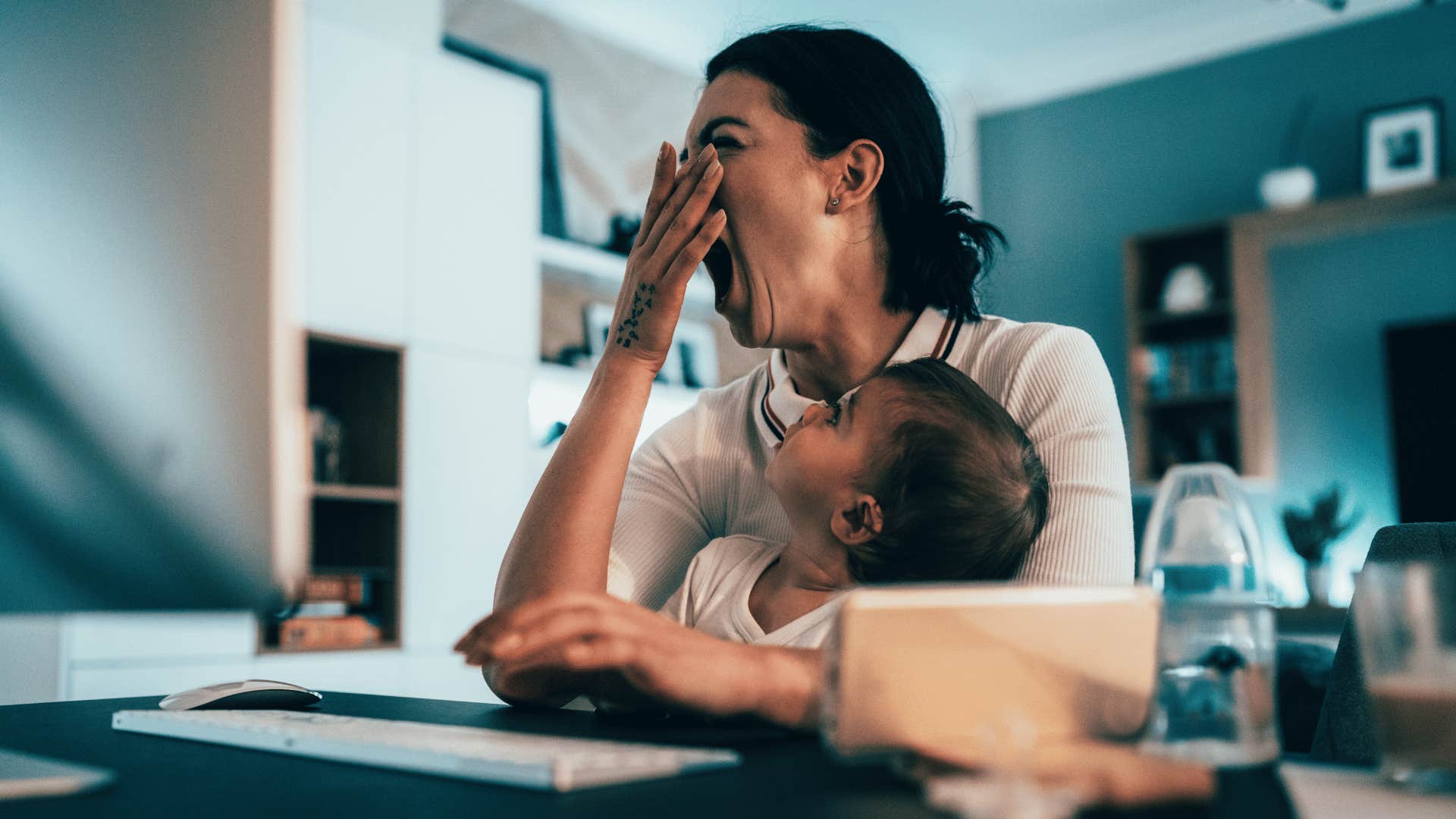 tired mother who sacrifices sleep for her child