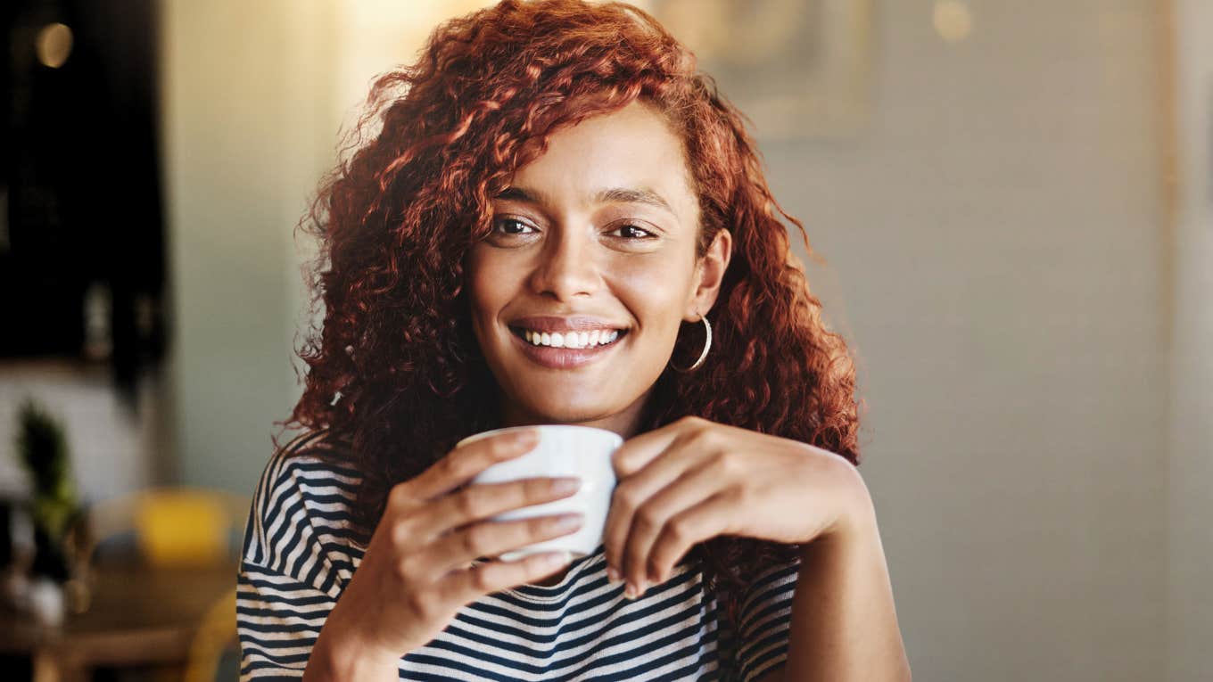 Woman with curly hair has unique qualities and magnetic appeal