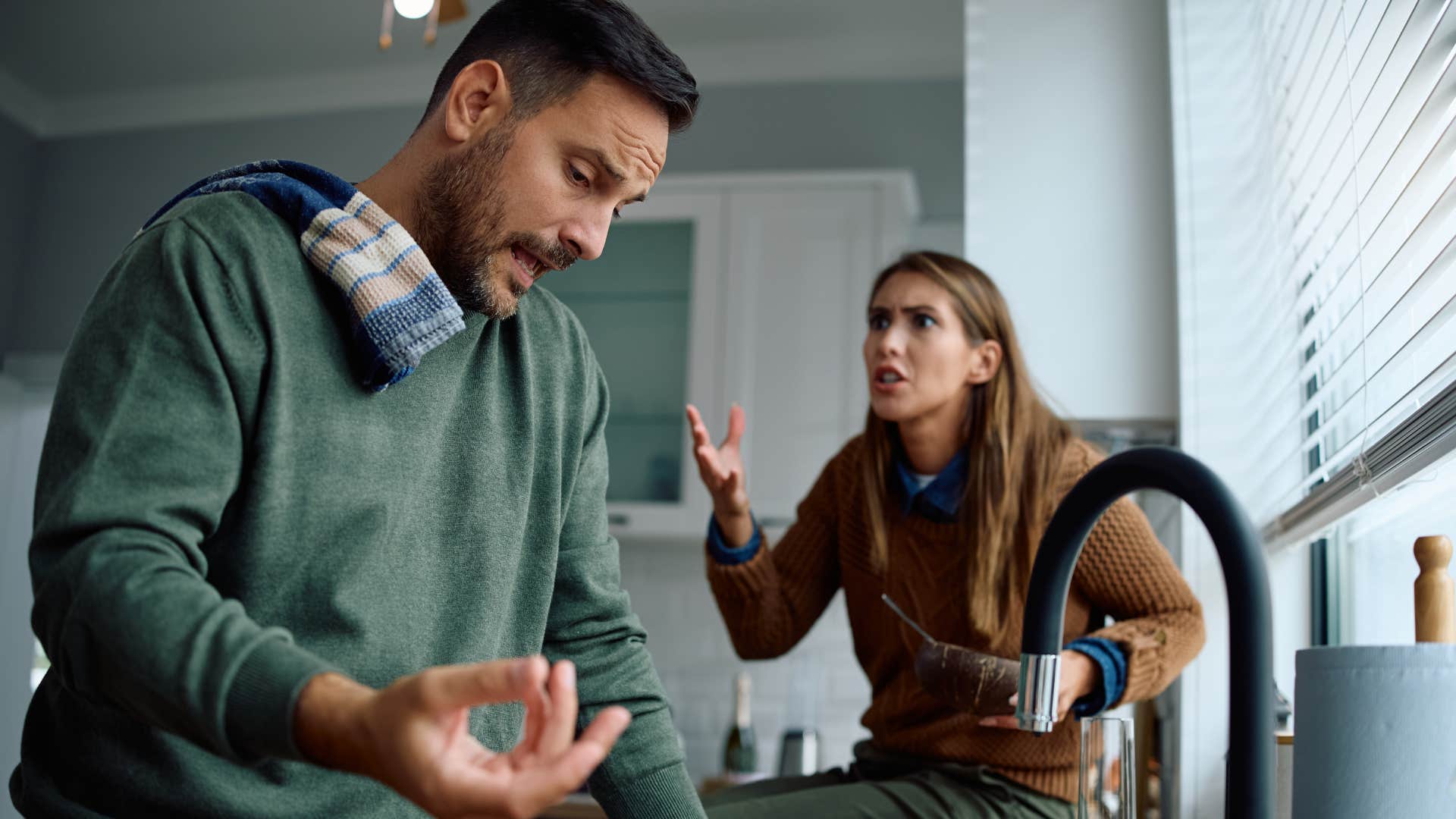 couple arguing in the kitchen over boundaries