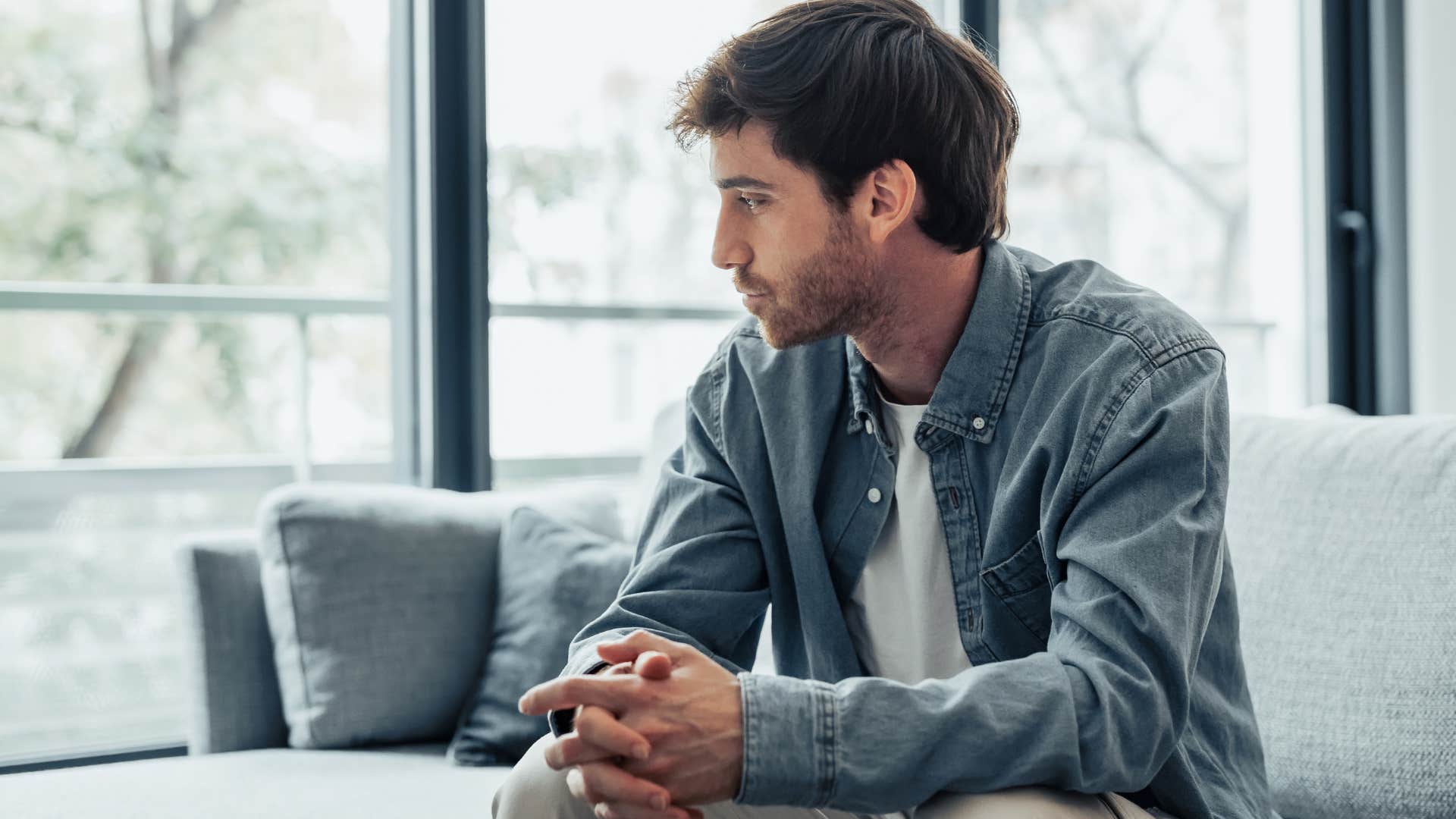 man sitting alone at home