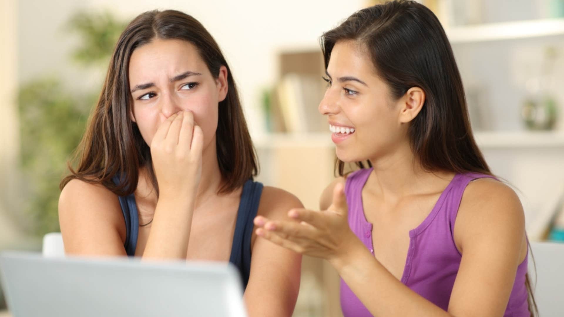 woman not being able to hide her disgust