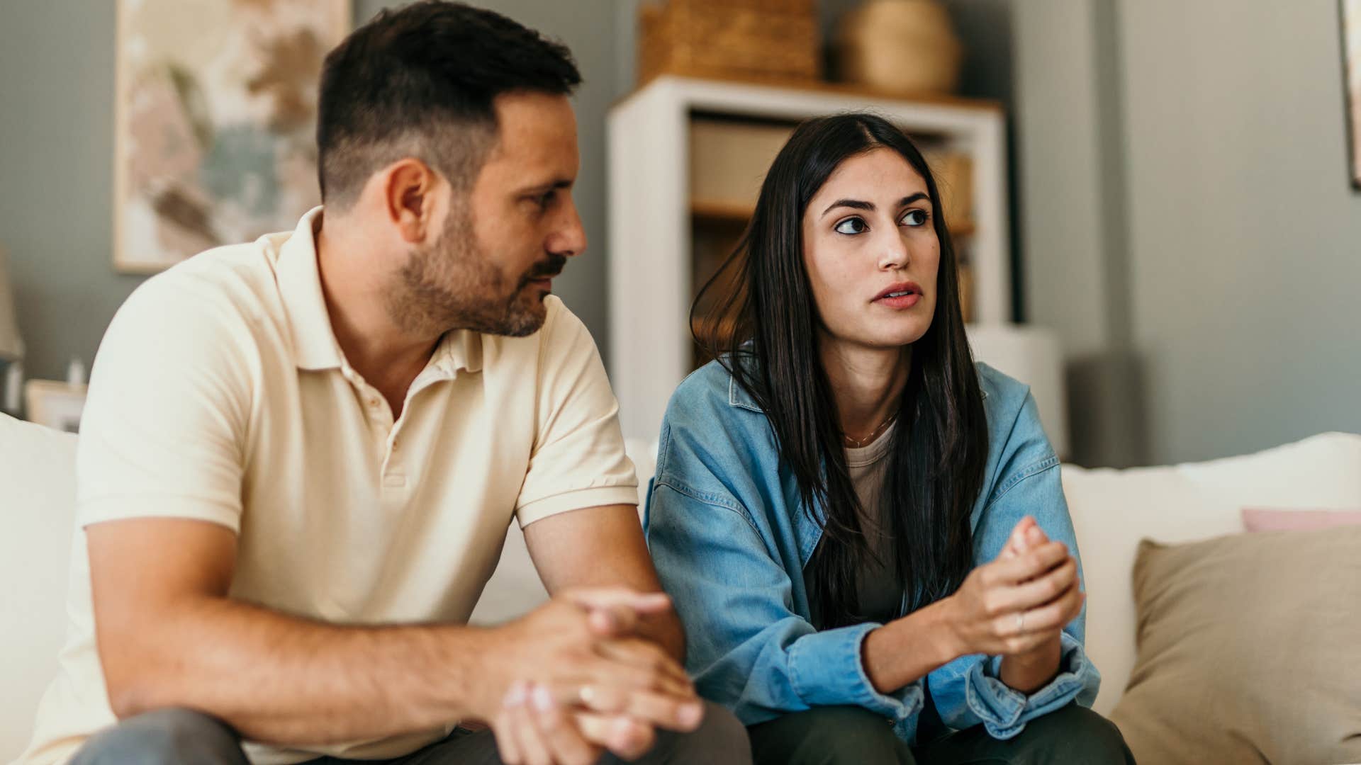 Upset couple refusing to talk about certain topics