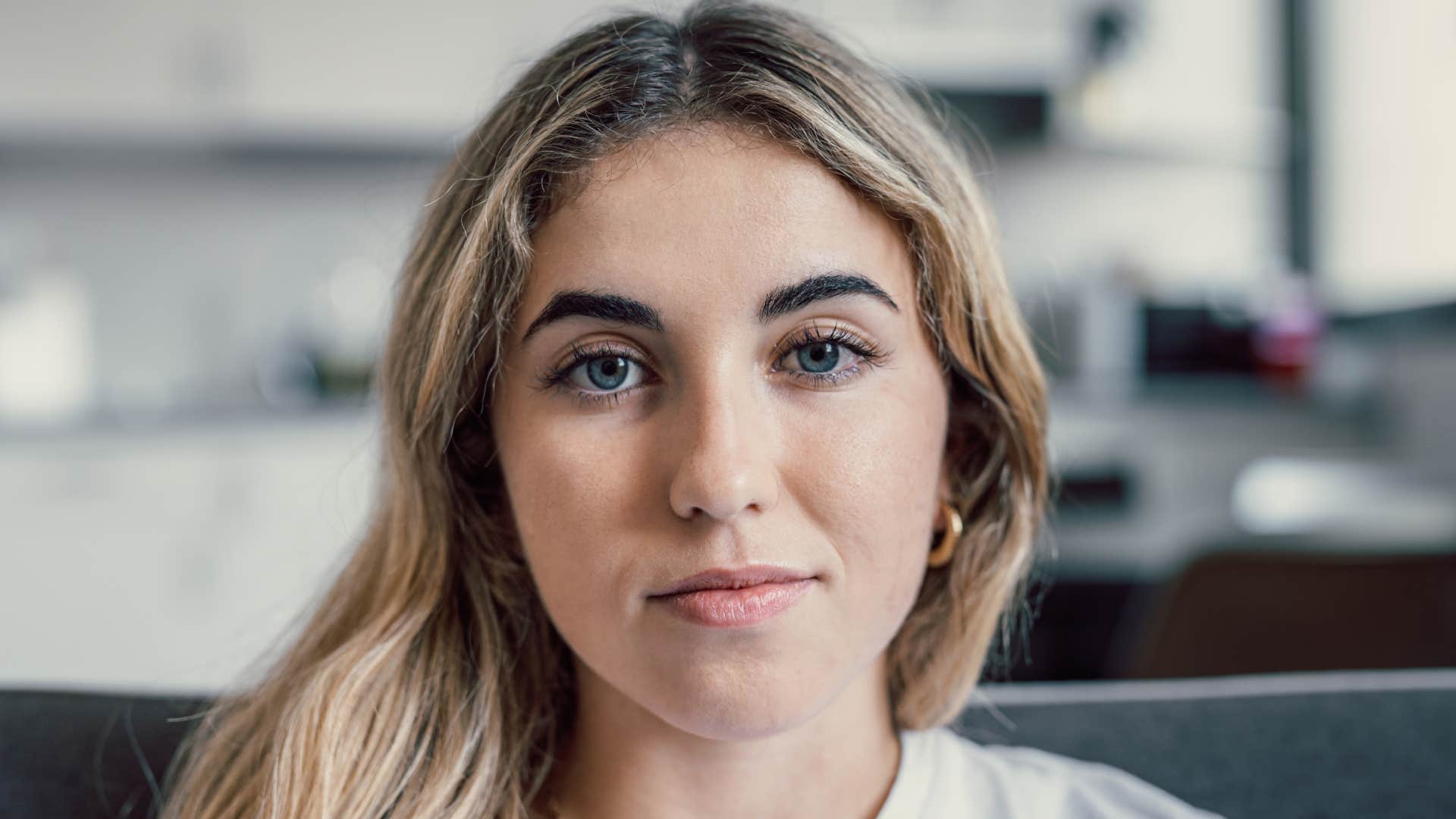 woman staring at camera sitting Declining invitations