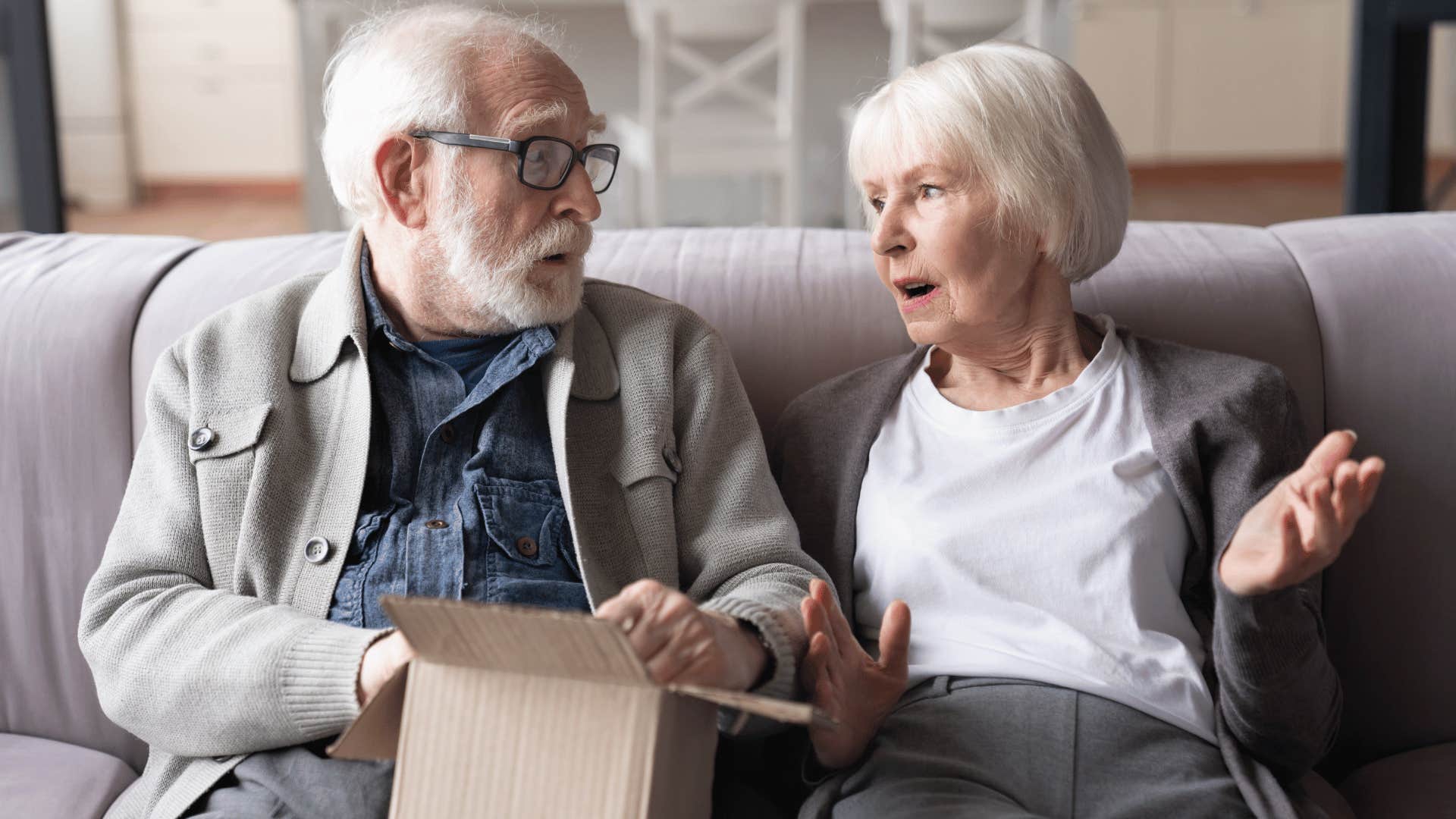 boomers complain to one another while sitting on the couch