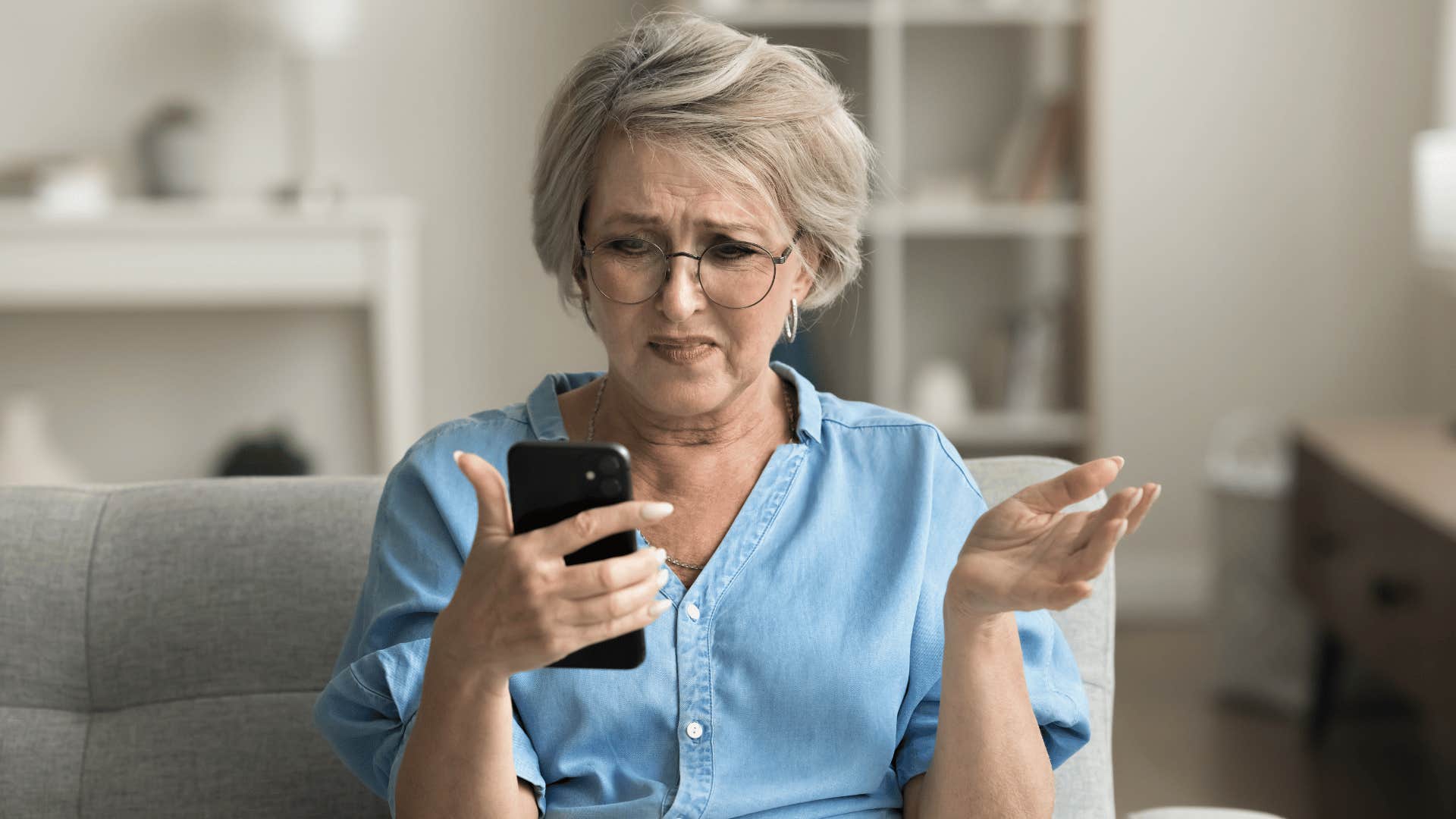 boomer complains while staring at her phone