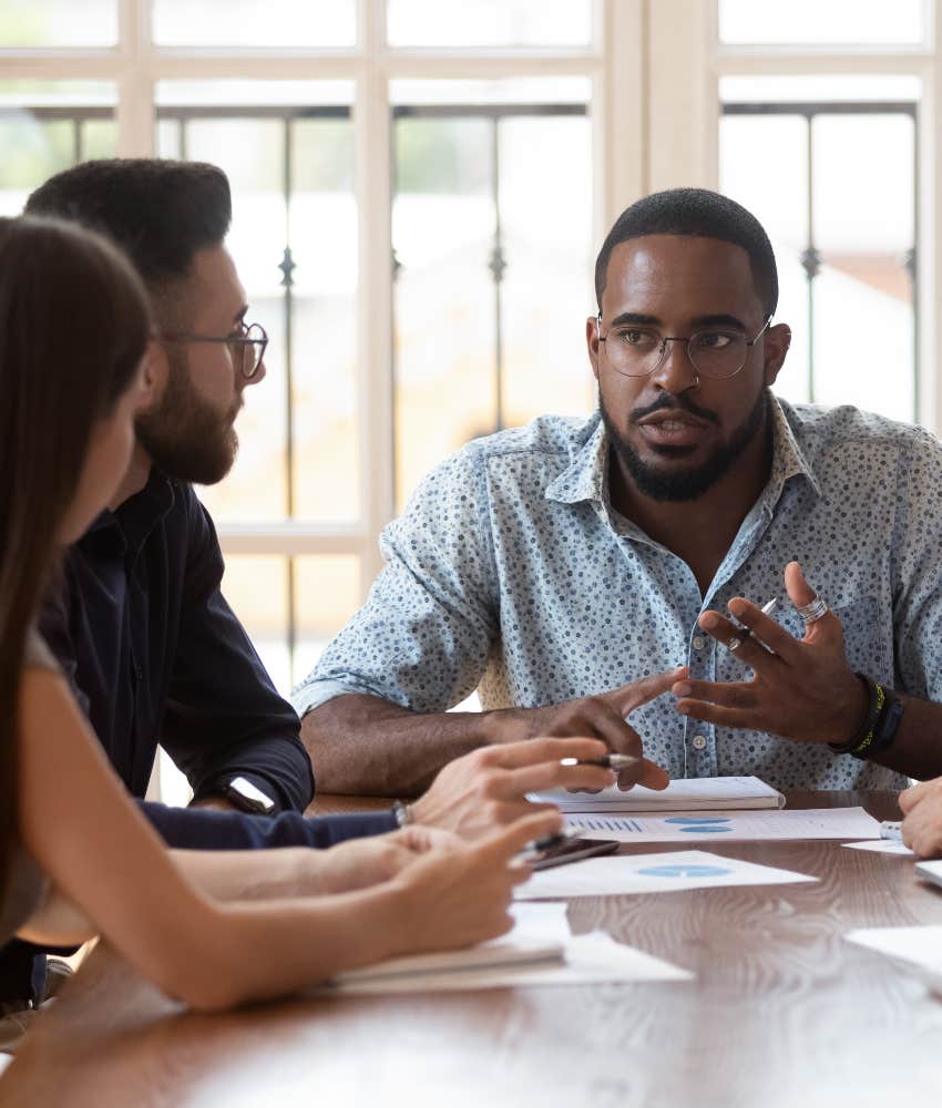 Boss leading a meeting and talking last