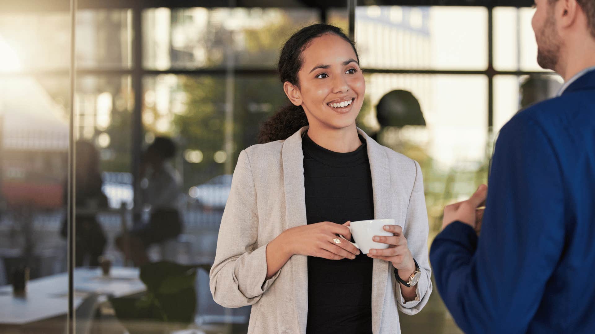 woman asking colleague to revisit conversation