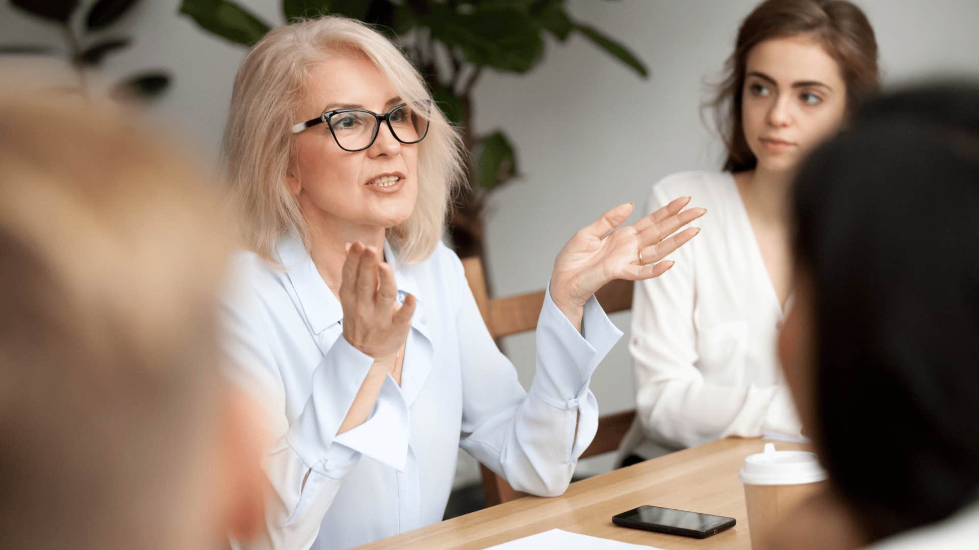 boss discussing empowerment with employees