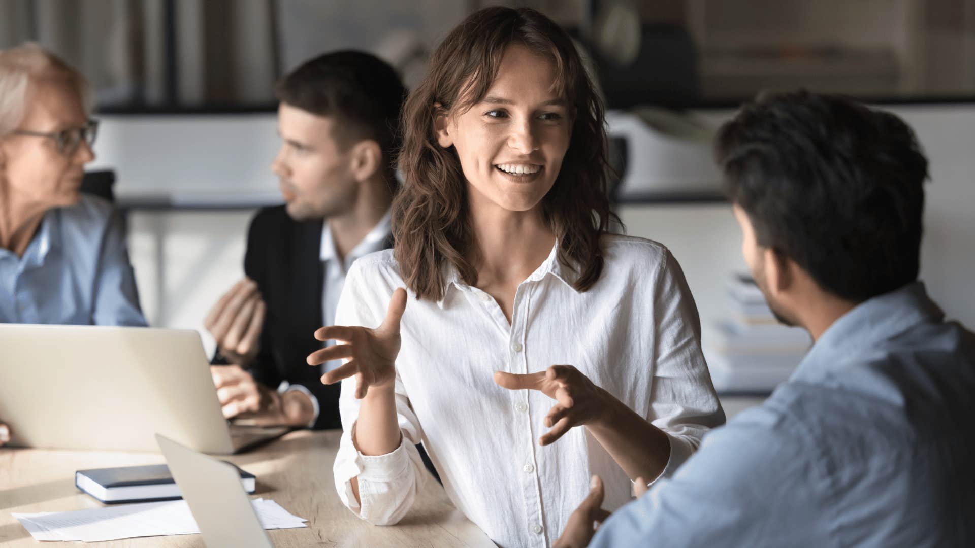 co-workers discussing how to optimize efficiency at work