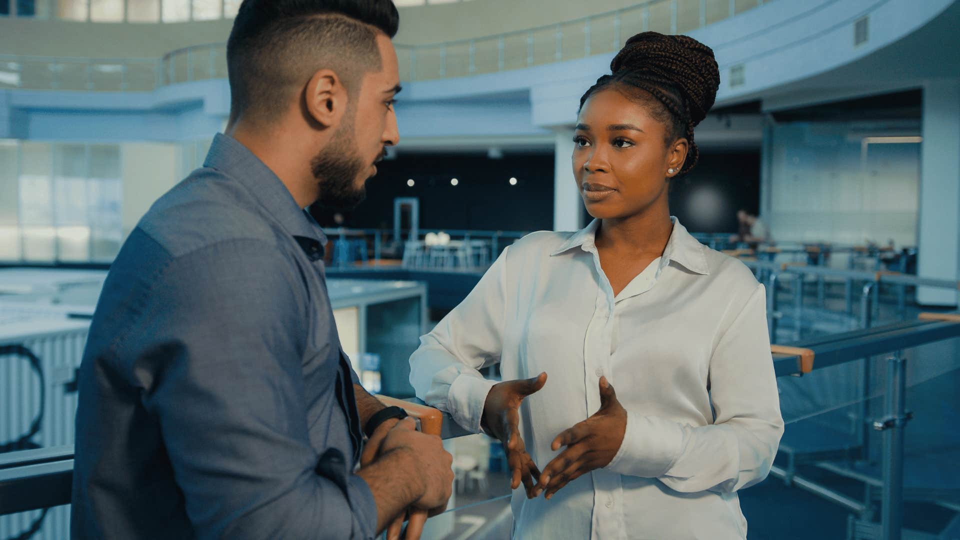 coworkers discussing new approach to tasks