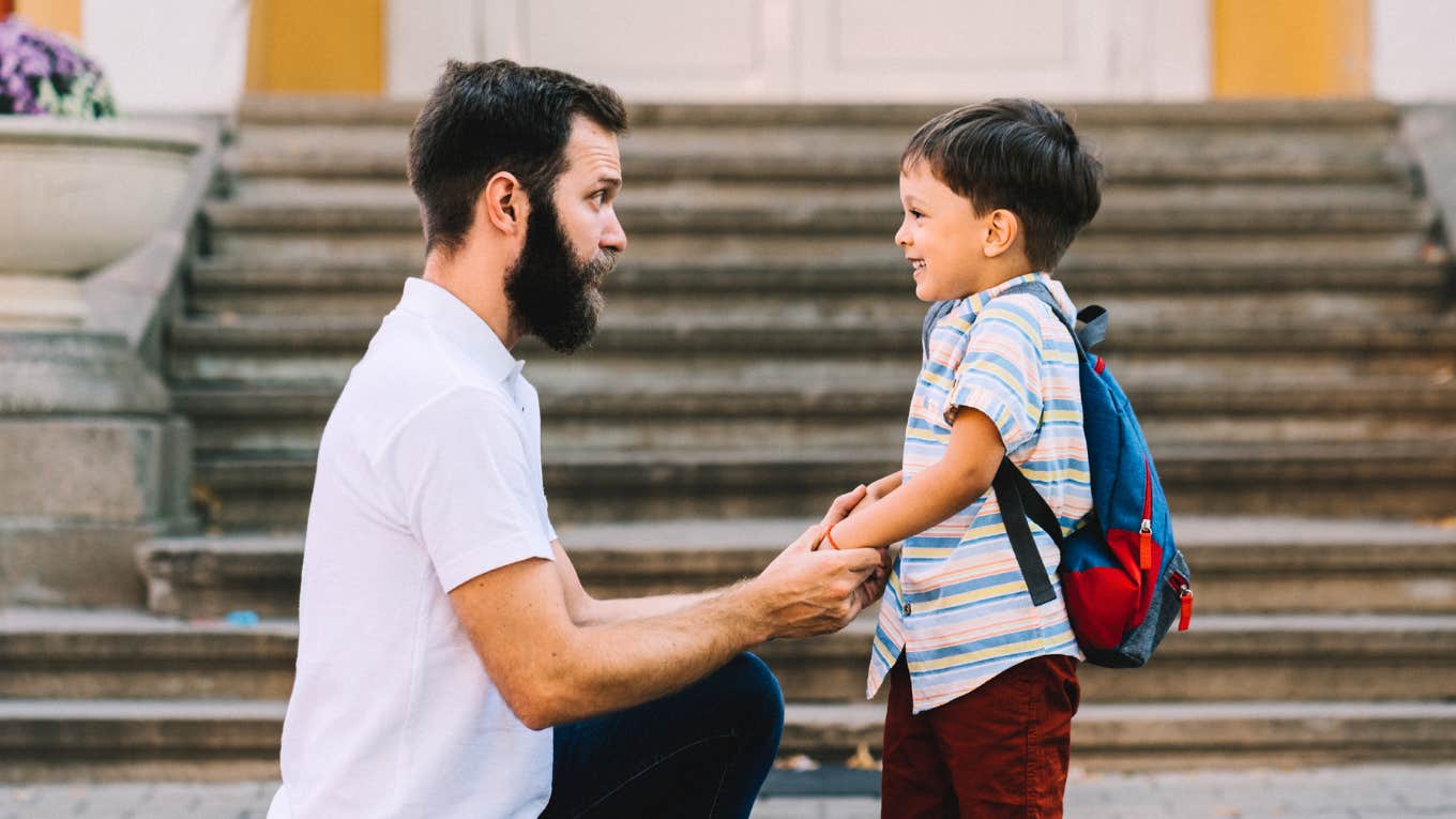 Millennial parenting his child. 