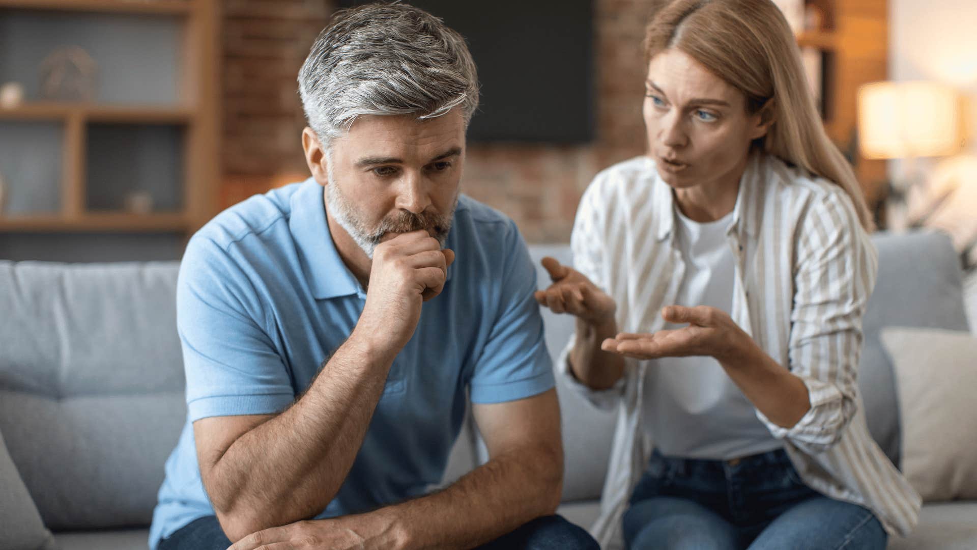 upset woman talking to man