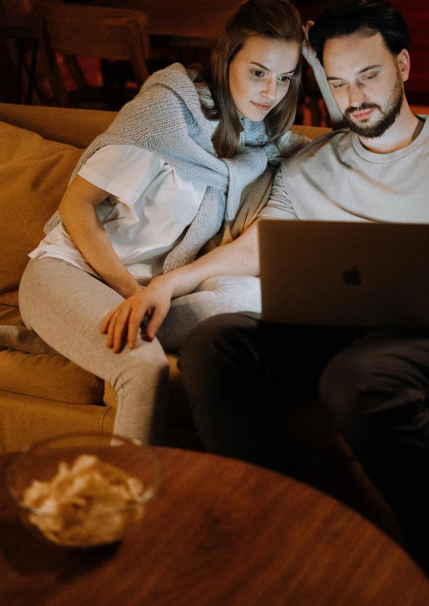 couple using subscription streaming services on their computer