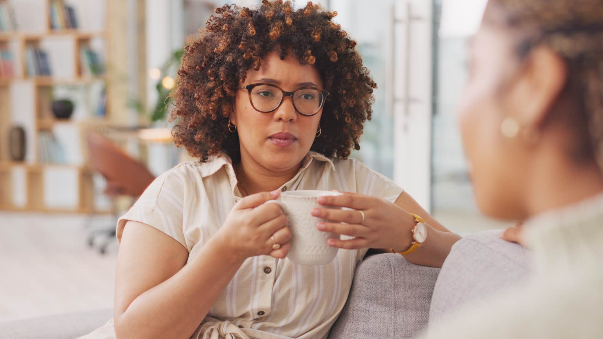 woman listening intently to friend she trusts