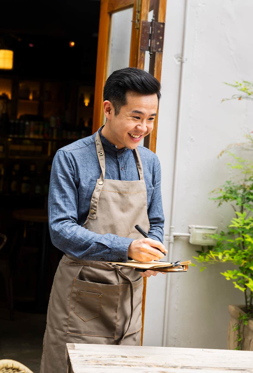 Server taking an order from a customer