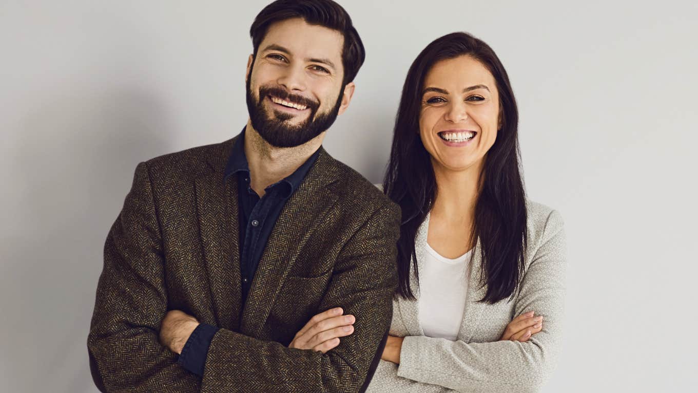 Brunette man and woman learning to trust after uncomfortable conversations