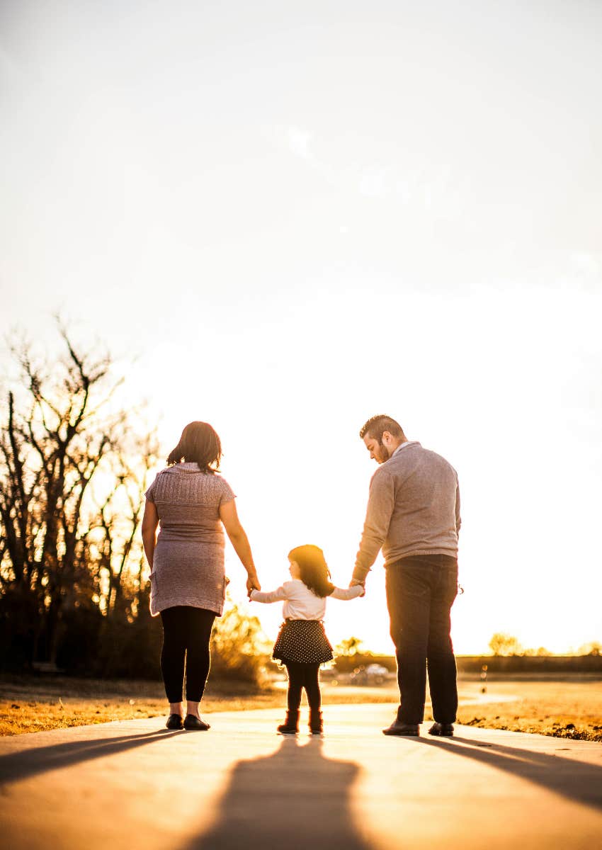 parents and child struggling with money