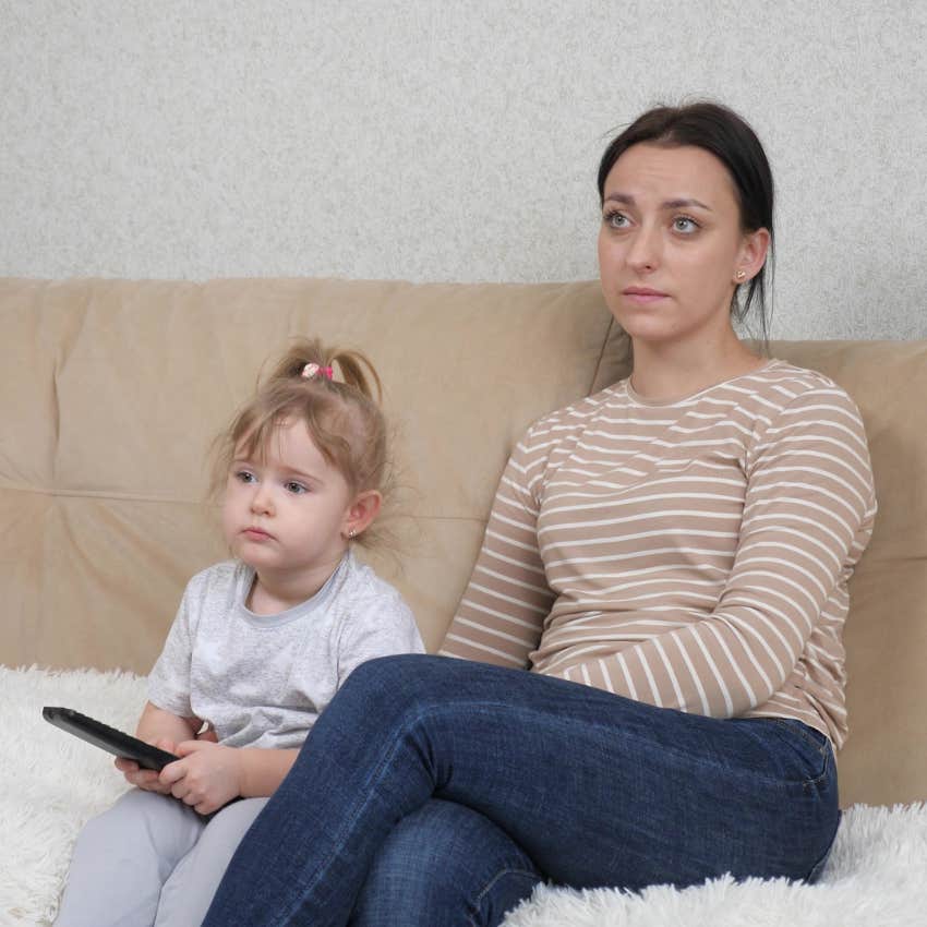 tired mother with daughter because attachment parenting took over her life