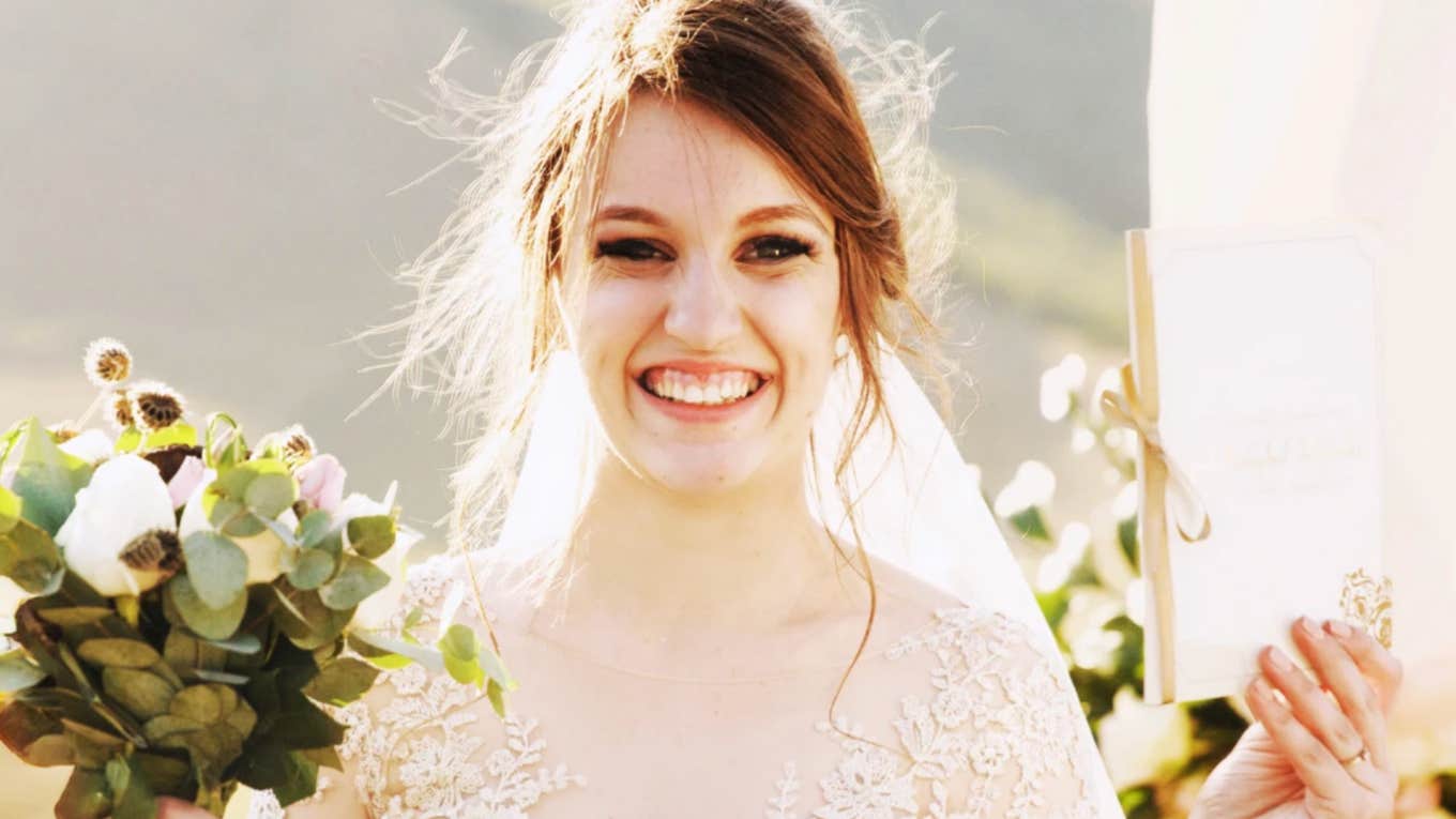 Brunette Gen Z bride smiles after rejecting Gen X wedding tradition