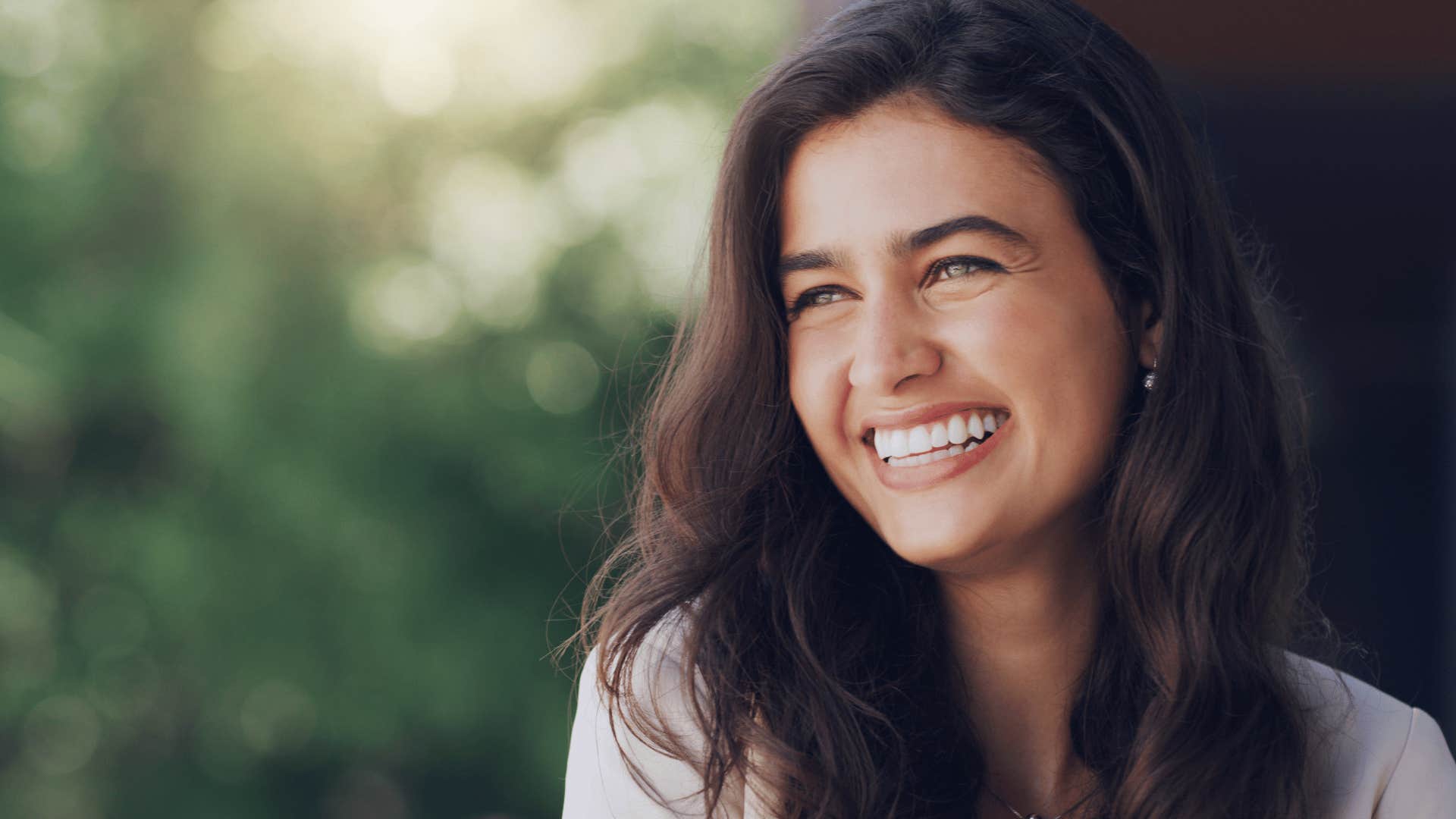 woman smiling outside